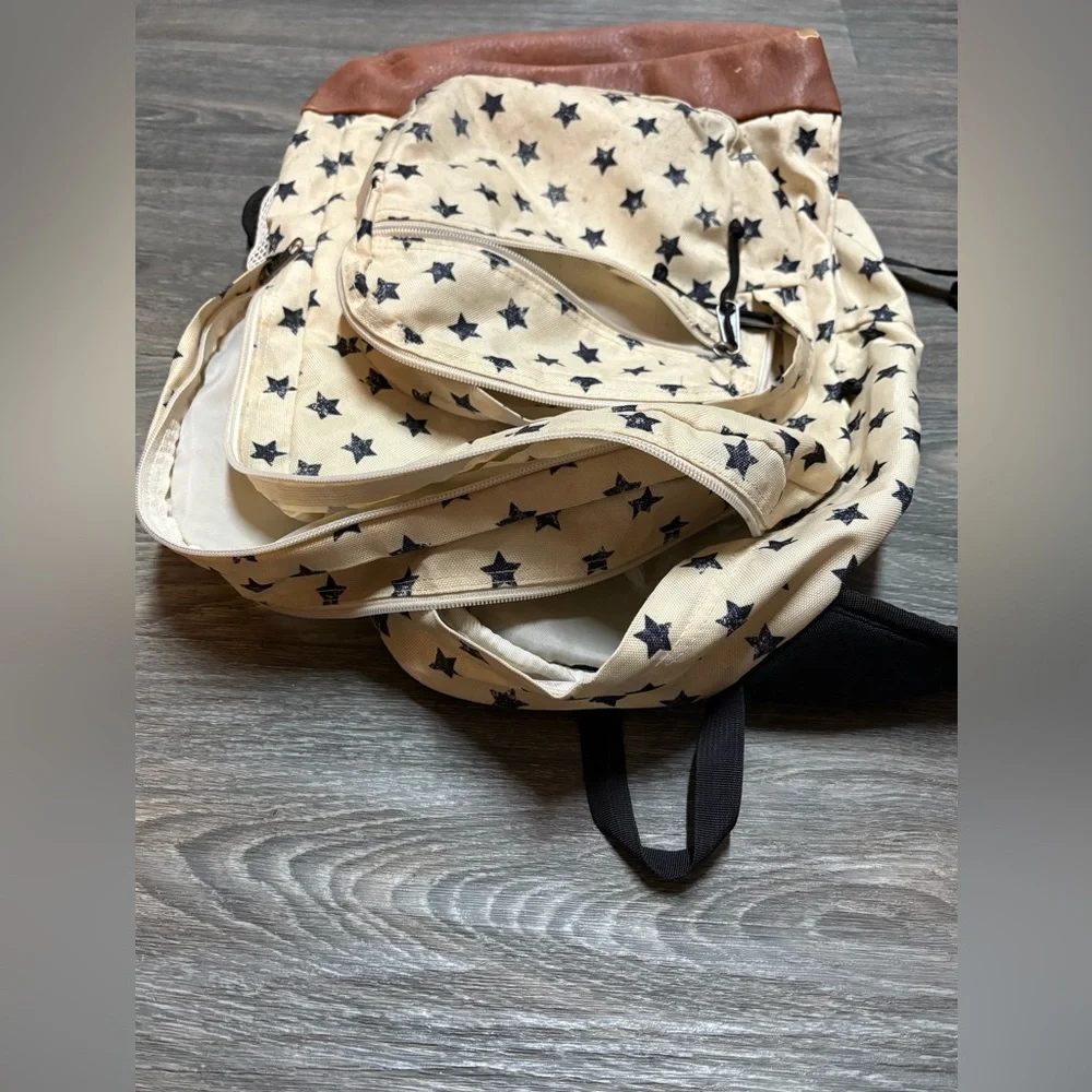 Star Patterned Trans Jansport Backpack - Cream and Brown